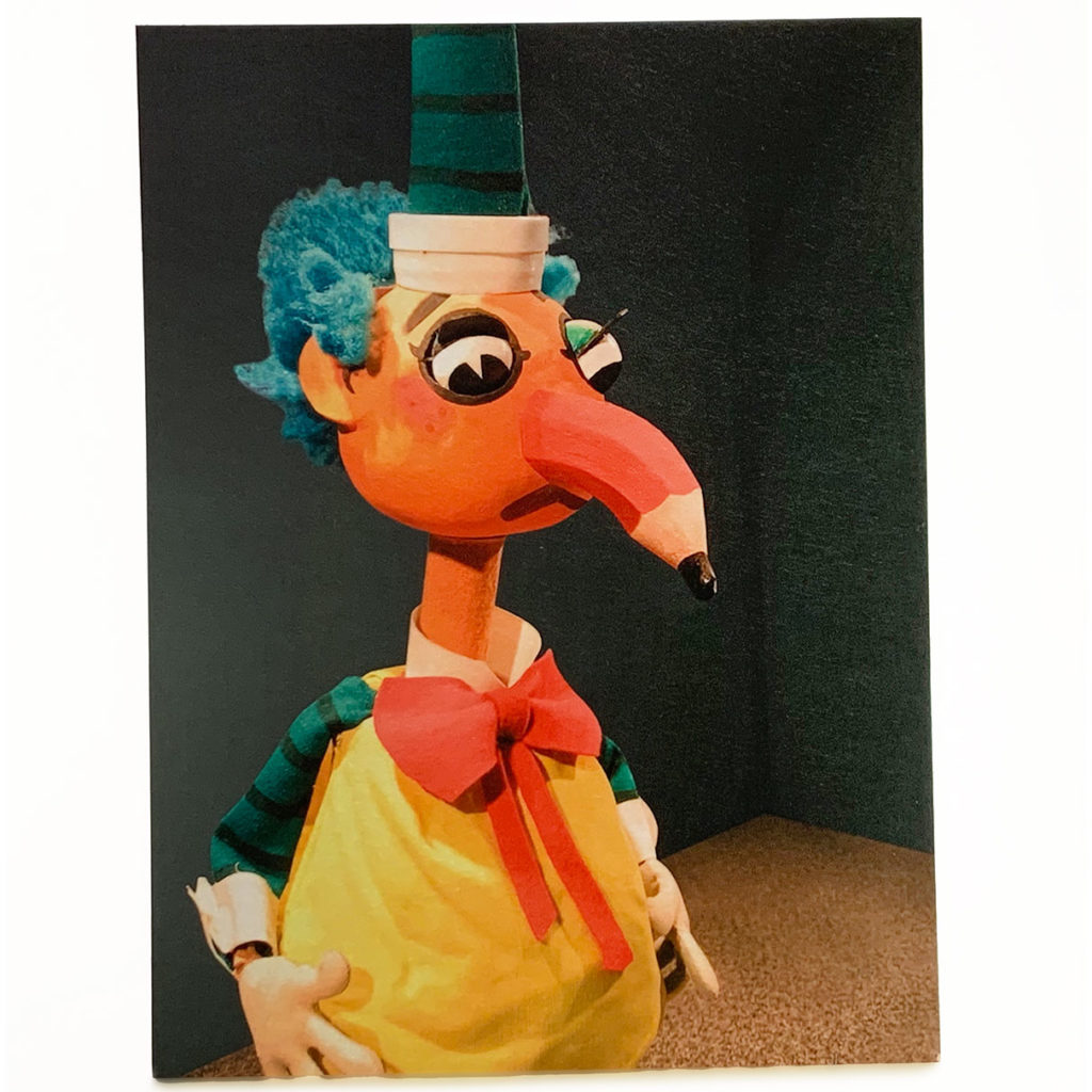 Puppet With Pencil Up His Nose